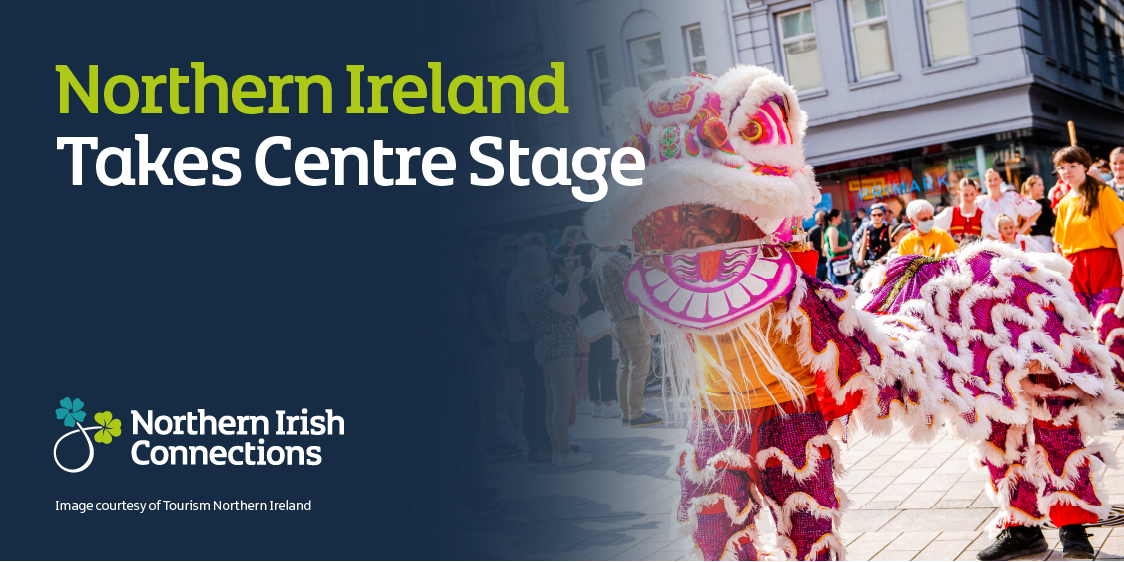 Text says Northern Ireland Takes Centre Stage. Image is of a man dressed as a  dragon in a parade