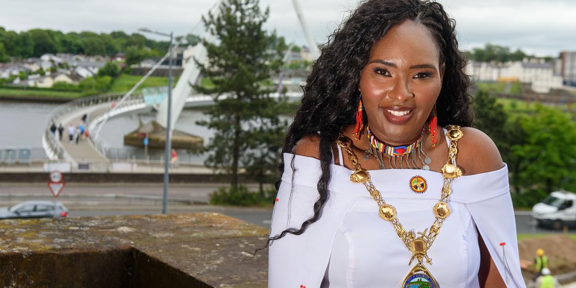 image of Mayor of Derry standing in front of the Peace Bridge