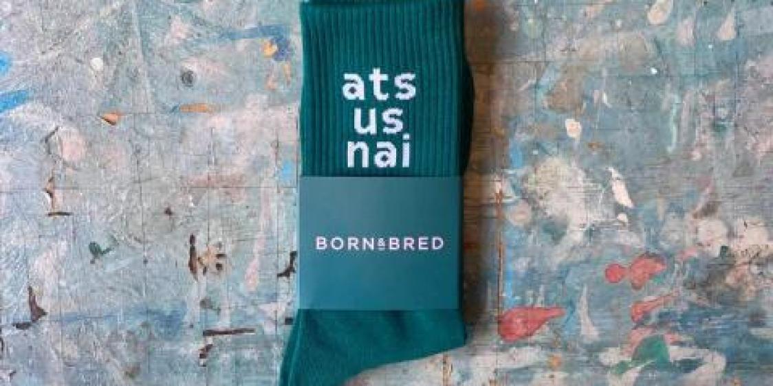 Image of socks with the words 'ats us nai' 
