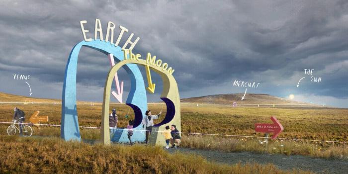 Image of Divis and Black Mountain with the Our Place in Space sculptures on the walking trail 